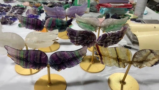 Assorted stone wing one pairs with metal stand