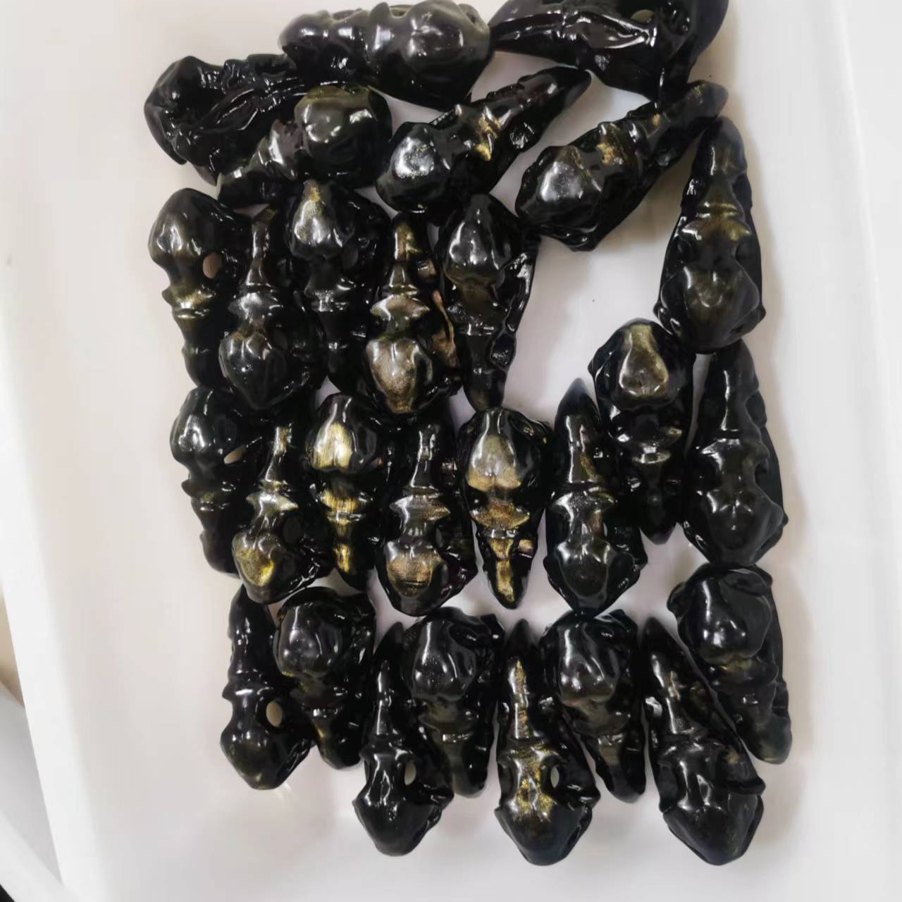Bird Head gold sheen obsidian