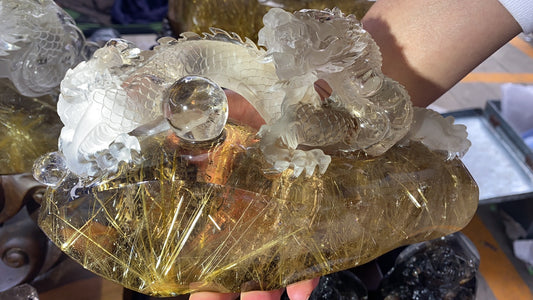 Gold hair rutilated quartz dragon with ball