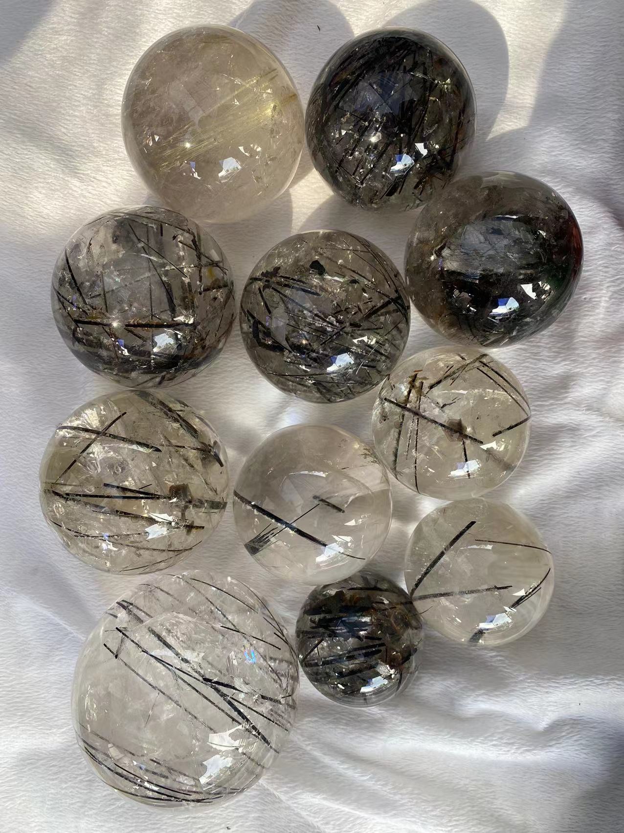 Black hair rutilated quartz assorted size sphere 2