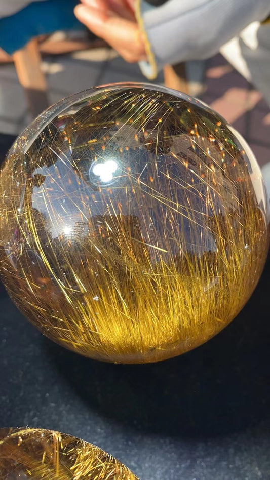 Gold hair rutilated quartz sphere 6