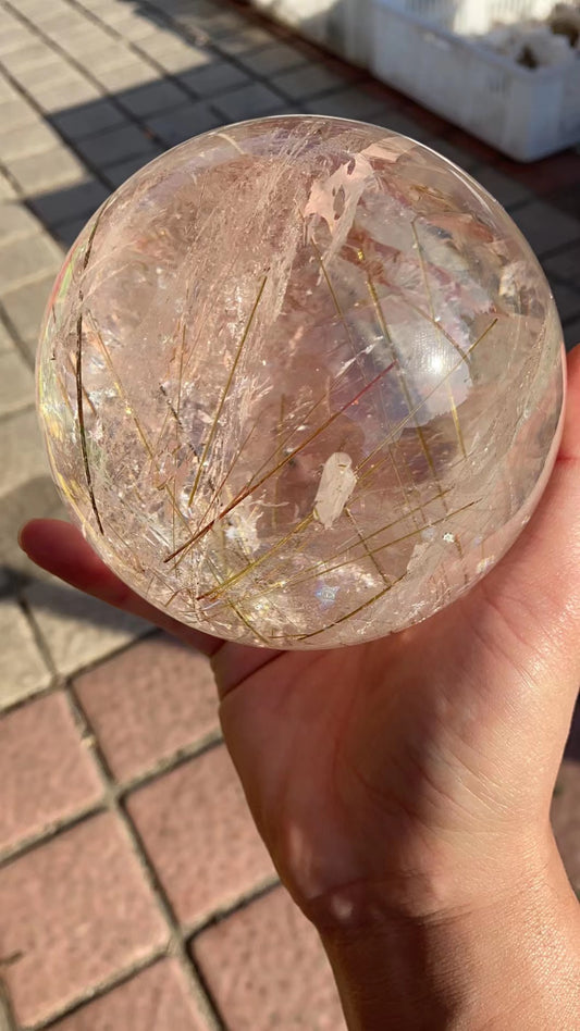 Gold hair rutilated quartz sphere 5