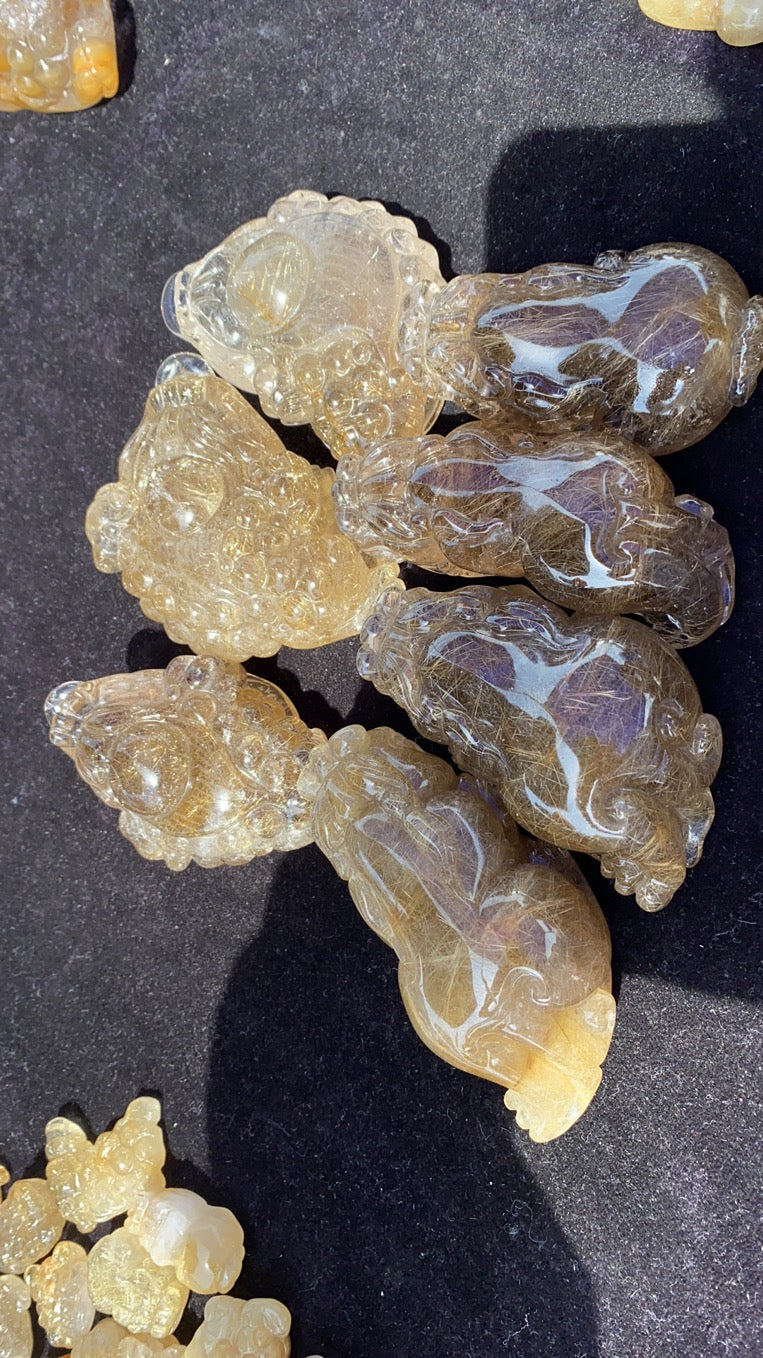 Gold hair rutilated quartz money frog