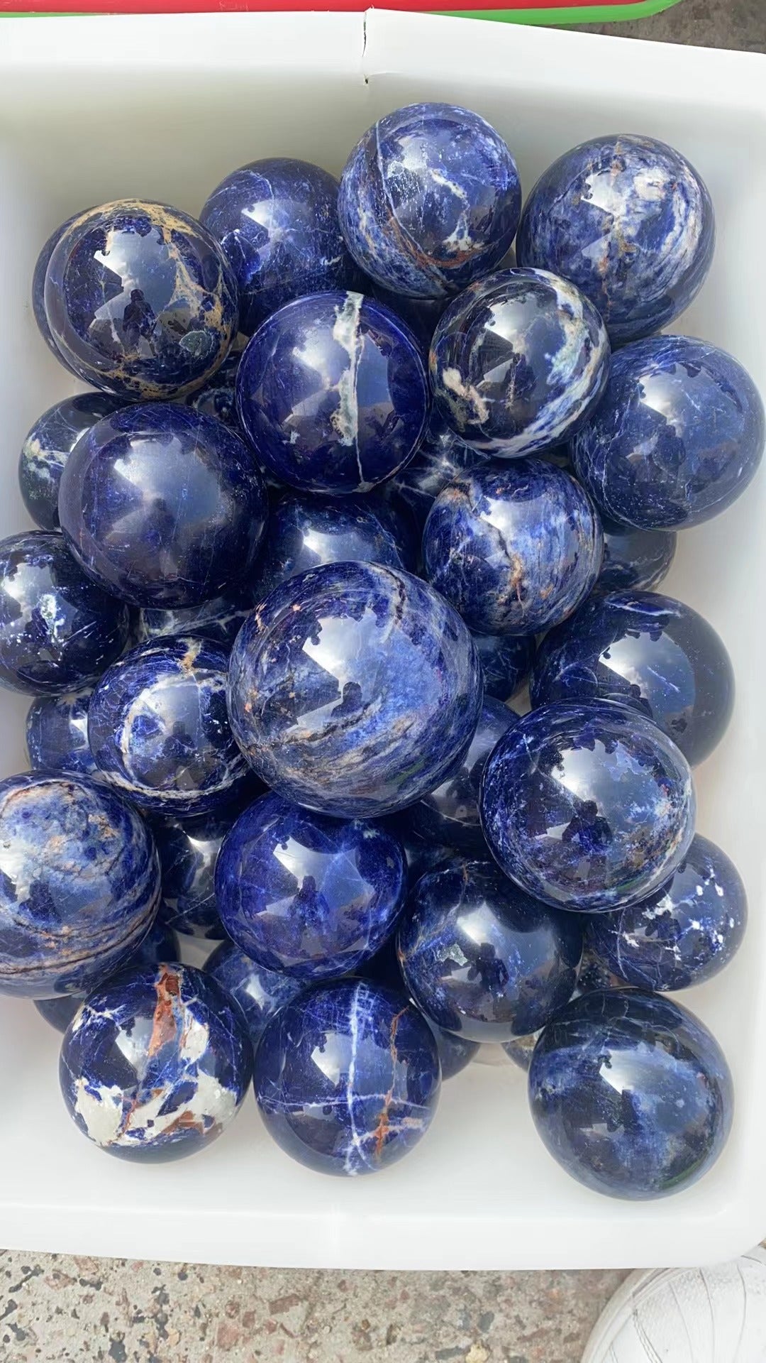 Sodalite assorted size sphere "A Grade"