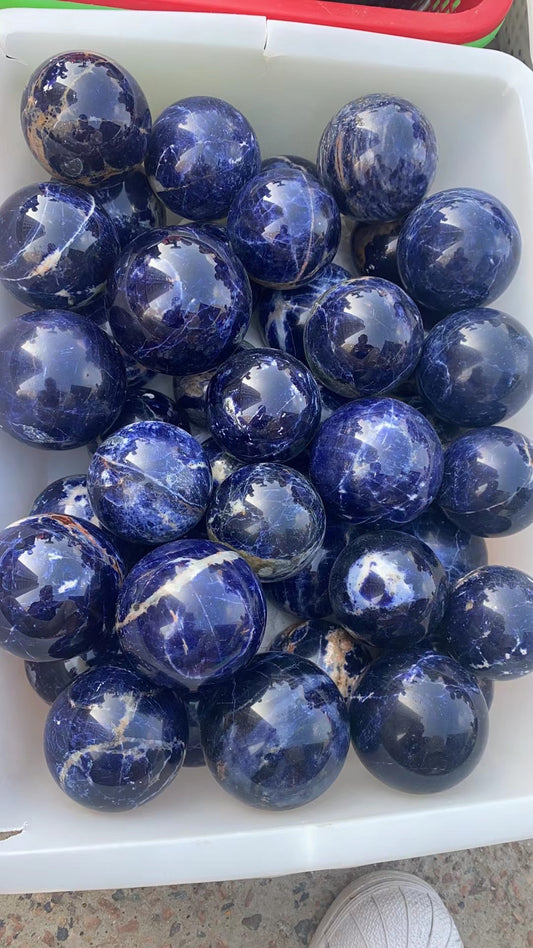 Sodalite assorted size sphere "A Grade"